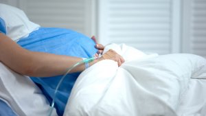 A woman about to give painful labor.