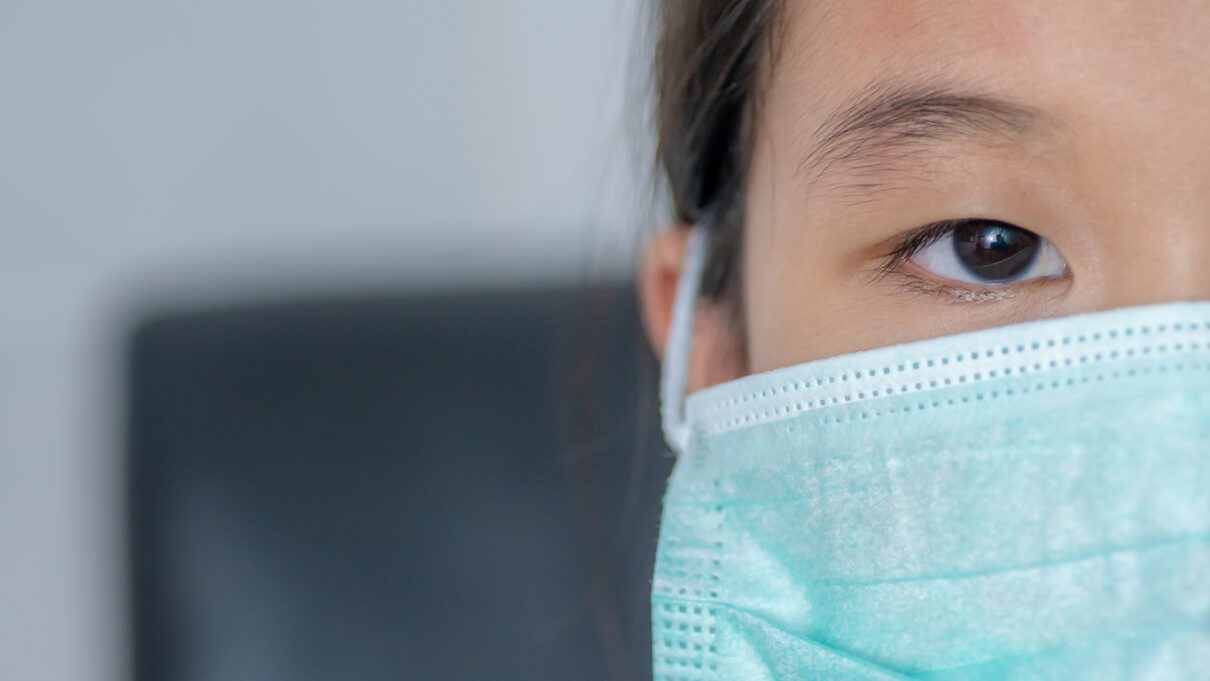 an asian patient experiencing racial discrimination in a medical setting